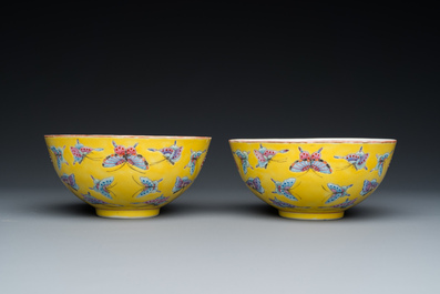 A pair of Chinese famille rose yellow-ground 'butterfly' bowls, Tongzhi mark, 20th C.