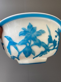 A Chinese blue-overlay white Beijing glass 'meiping' vase, a bowl and a bottle, 19/20th C.