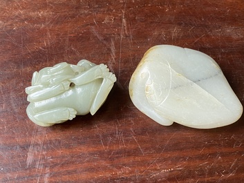 A Chinese celadon jade carving of a lion with cub and a white jade carving of a goose, Qing