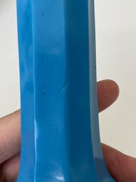A Chinese turquoise blue Peking glass facetted bottle vase, Qianlong mark and of the period