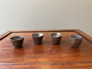Four Chinese silver-lined coconut cups, Wang Hengxin 王恒馨 mark, 19/20th C.