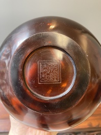 A rare Chinese translucent amber-coloured Peking glass bottle vase, Qianlong mark and of the period