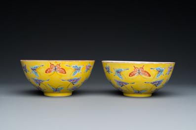 A pair of Chinese famille rose yellow-ground 'butterfly' bowls, Tongzhi mark, 20th C.