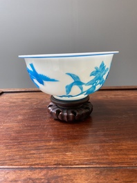 A Chinese blue-overlay white Beijing glass 'meiping' vase, a bowl and a bottle, 19/20th C.