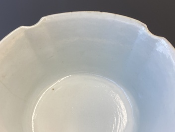 A Chinese famille rose bowl, a 'peaches' plate, a blue and white and iron-red bowl and a 'phoenix' plate, Wanli and Jiaqing marks, 19th C.