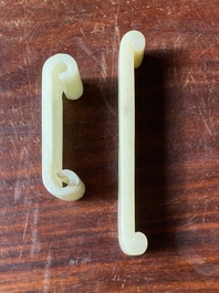 Two fine Chinese white and celadon jade brush rests, Qing