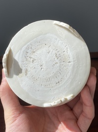 A Chinese Dehua blanc de Chine tripod censer, Kangxi