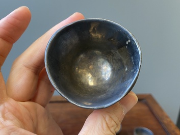 Four Chinese silver-lined coconut cups, Wang Hengxin 王恒馨 mark, 19/20th C.