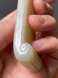 Two fine Chinese white and celadon jade brush rests, Qing