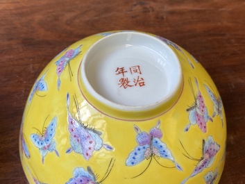 A pair of Chinese famille rose yellow-ground 'butterfly' bowls, Tongzhi mark, 20th C.