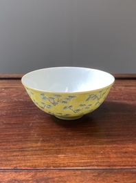 A Chinese blue and white bowl with floral design and a famille verte yellow-ground 'bamboo' bowl, Tongzhi mark, 18/19th C.
