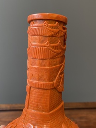 A Chinese coral-red Peking glass bottle vase, Daoguang mark and probably of the period