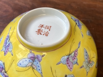 A pair of Chinese famille rose yellow-ground 'butterfly' bowls, Tongzhi mark, 20th C.