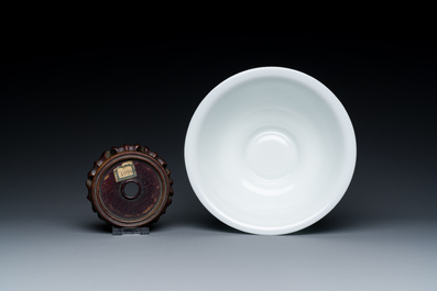 A Chinese blue-overlay white Beijing glass 'meiping' vase, a bowl and a bottle, 19/20th C.