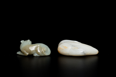 A Chinese celadon jade carving of a lion with cub and a white jade carving of a goose, Qing