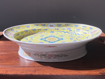 An oval Chinese famille rose yellow-ground footed 'birthday' dish, Guangxu mark and of the period