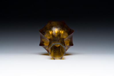 A Chinese facetted translucent amber-coloured Peking glass bottle vase, Qianlong mark, 19th C.