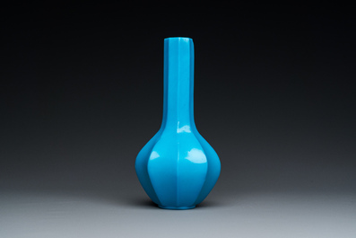 A Chinese turquoise blue Peking glass facetted bottle vase, Qianlong mark and of the period