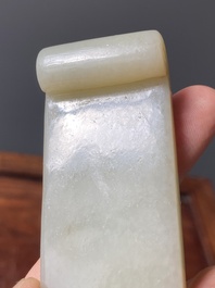 Two fine Chinese white and celadon jade brush rests, Qing