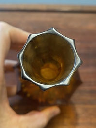 A Chinese facetted translucent amber-coloured Peking glass bottle vase, Qianlong mark, 19th C.