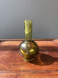 A rare Chinese translucent green Peking glass bottle vase, Qianlong mark and of the period