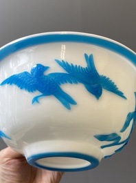 A Chinese blue-overlay white Beijing glass 'meiping' vase, a bowl and a bottle, 19/20th C.