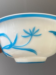 A Chinese blue-overlay white Beijing glass 'meiping' vase, a bowl and a bottle, 19/20th C.