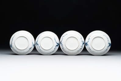 Four Chinese blue and white 'landscape' cups and saucers, Kangxi