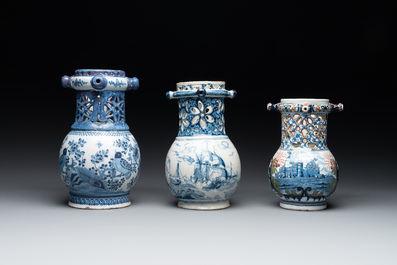 Two blue and white and one polychrome Dutch Delft puzzle jugs, dated 1734 and 1705, 18th C. and later