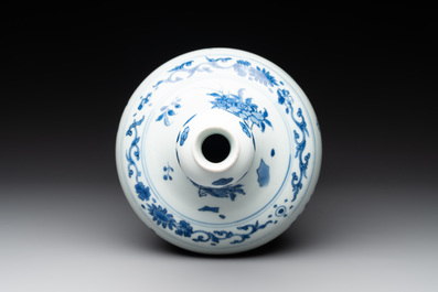 A Chinese blue and white bottle vase with floral sprigs, Transitional period