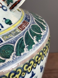 A Chinese doucai 'antiquities' 'hu' vase, Qianlong mark, 19th C.