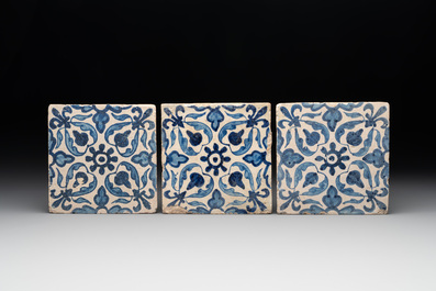 Five blue and white Dutch Delft tiles with floral design, 17th C.