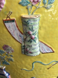A Chinese famille rose yellow-ground relief-molded 'antiquities' fish bowl, Zhengde mark, 19th C.