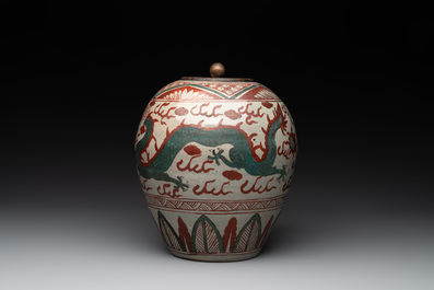 A Chinese Swatow green- and red-enamelled 'dragon' jar and a pair of covered bowls, Ming