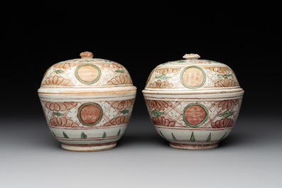 A Chinese Swatow green- and red-enamelled 'dragon' jar and a pair of covered bowls, Ming