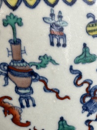 A Chinese doucai 'antiquities' 'hu' vase, Qianlong mark, 19th C.