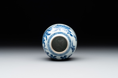 A Chinese blue and white bell-shaped water pot with birds among flowering branches, Kangxi