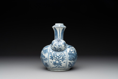 A Chinese blue and white 'kraak' porcelain 'deer and rooster' kendi, Wanli
