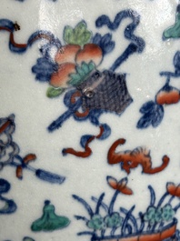 A Chinese doucai 'antiquities' 'hu' vase, Qianlong mark, 19th C.