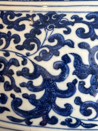 A large Chinese blue and white 'flower scroll' vase, Qianlong mark, 19th C.