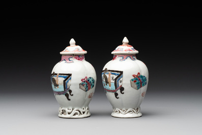 A pair of Chinese famille rose 'antiquities' tea caddies and covers, Yongzheng/Qianlong