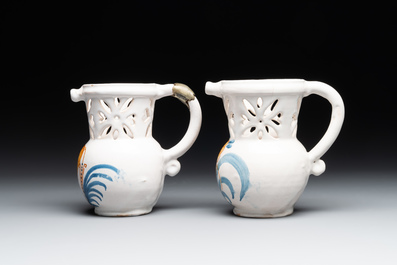 Three French white-glazed and two polychrome puzzle jugs, Nevers, 18th C.