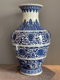 A large Chinese blue and white 'flower scroll' vase, Qianlong mark, 19th C.