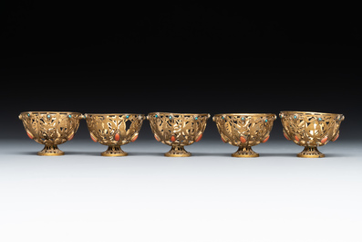 An Ottoman coral-and-turquoise-inlaid gilt-copper tea service with five Chinese wucai cups, 19th C.