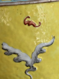 A Chinese famille rose yellow-ground relief-molded 'antiquities' fish bowl, Zhengde mark, 19th C.