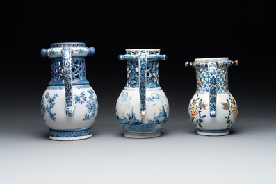 Two blue and white and one polychrome Dutch Delft puzzle jugs, dated 1734 and 1705, 18th C. and later