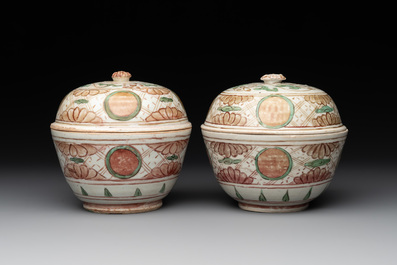 A Chinese Swatow green- and red-enamelled 'dragon' jar and a pair of covered bowls, Ming