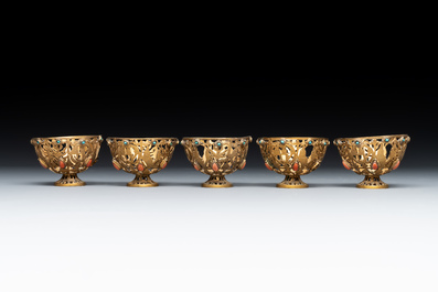 An Ottoman coral-and-turquoise-inlaid gilt-copper tea service with five Chinese wucai cups, 19th C.