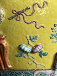 A Chinese famille rose yellow-ground relief-molded 'antiquities' fish bowl, Zhengde mark, 19th C.