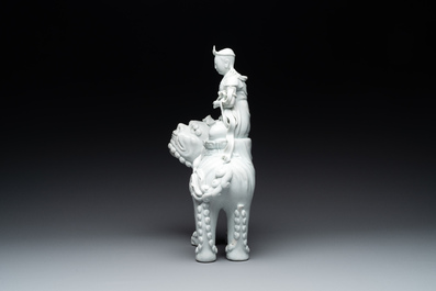 Two Chinese white-glazed Bodhisattva, a sancai-glazed duck and a turquoise-glazed lion, 20th C.